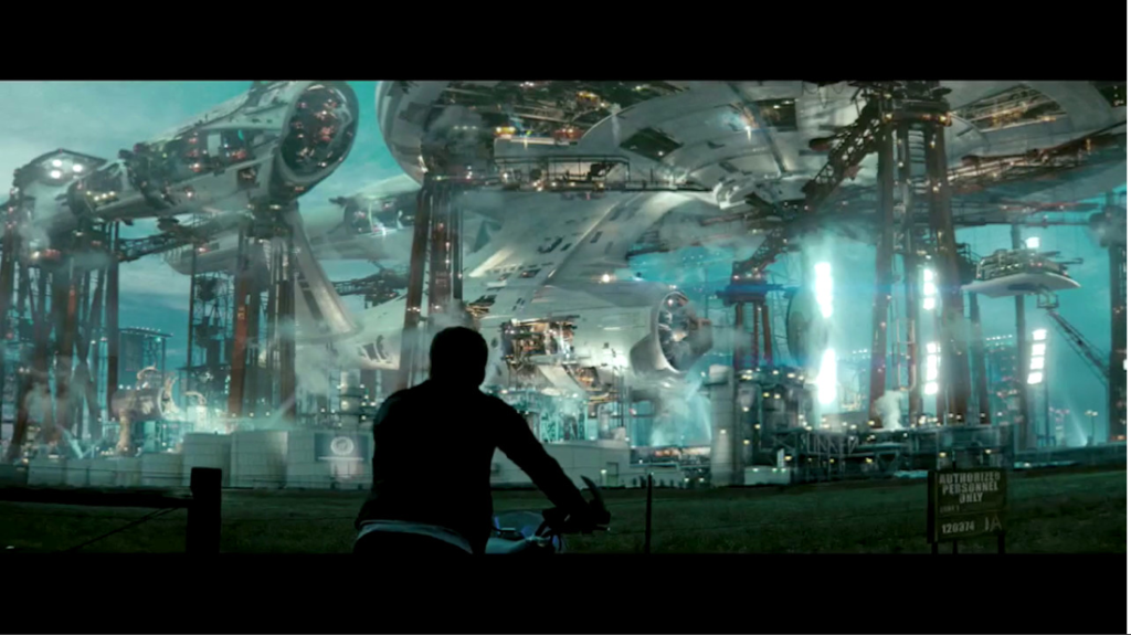 Young James Kirk looks at the USS Starship Enterprise